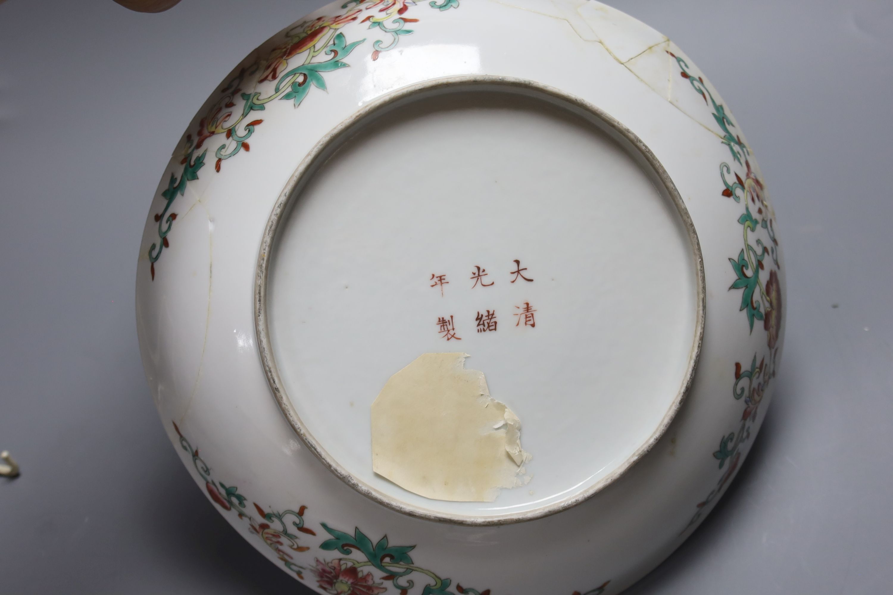 Two Chinese blue and white vases and a dish, together with a famille rose dish, tallest 28cm